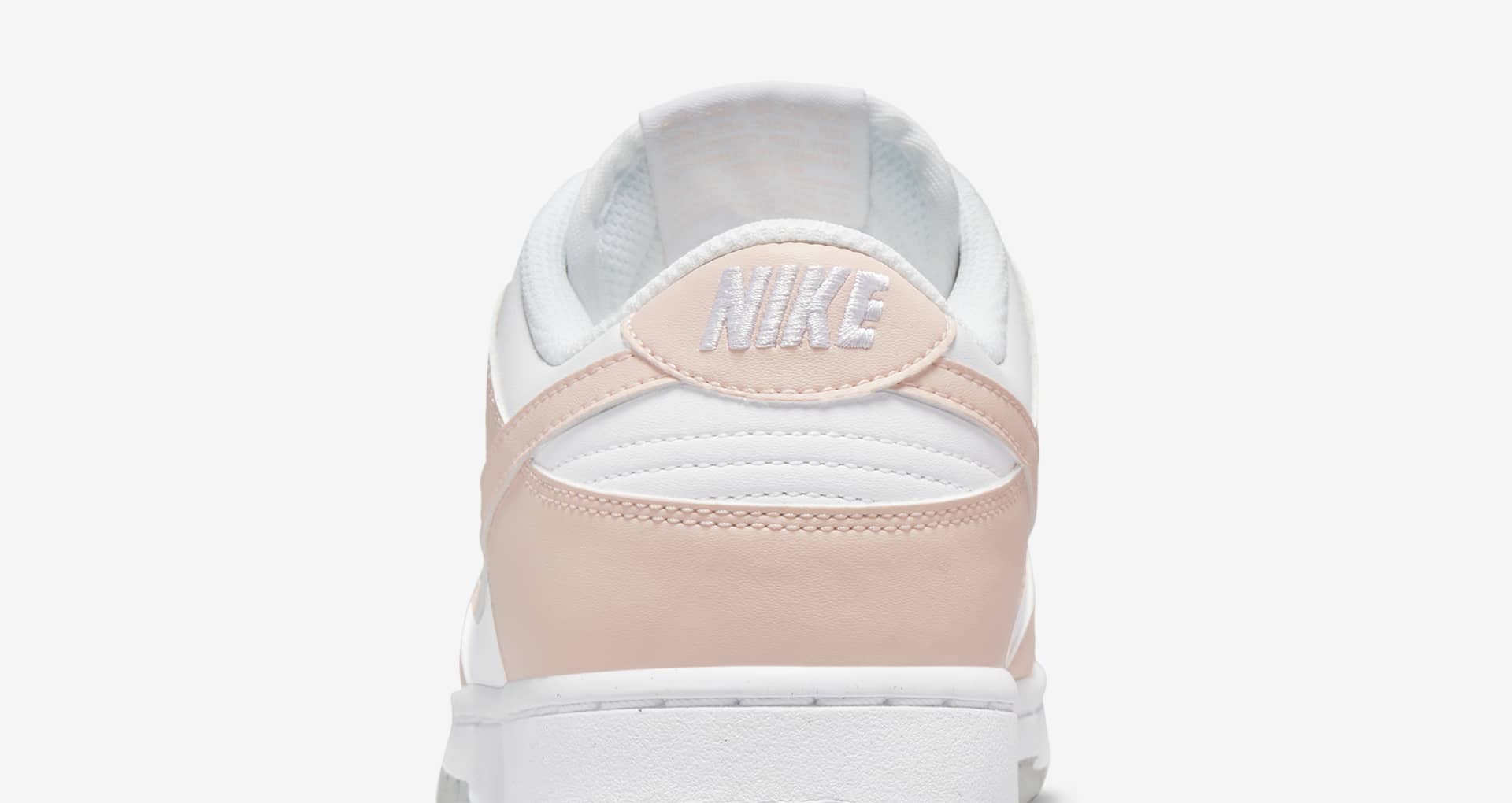 dunk low next nature pale coral