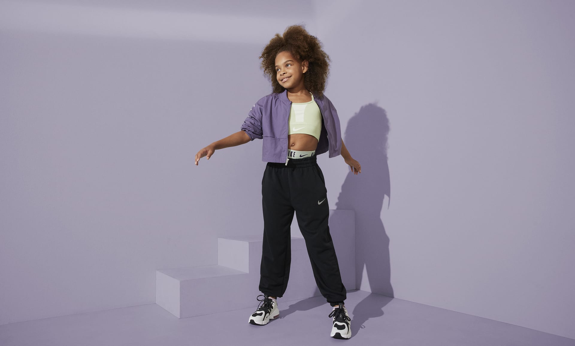 Nike Sportswear Older Kids' (Girls') Dri-FIT Loose Fleece Joggers. Nike PT