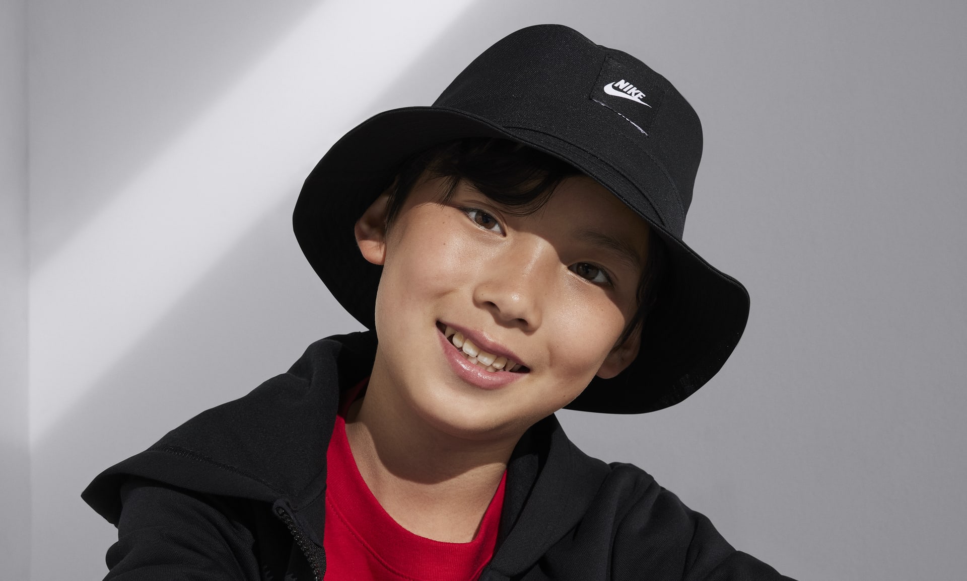 Nike Apex Kids' Futura Bucket Hat. Nike SE