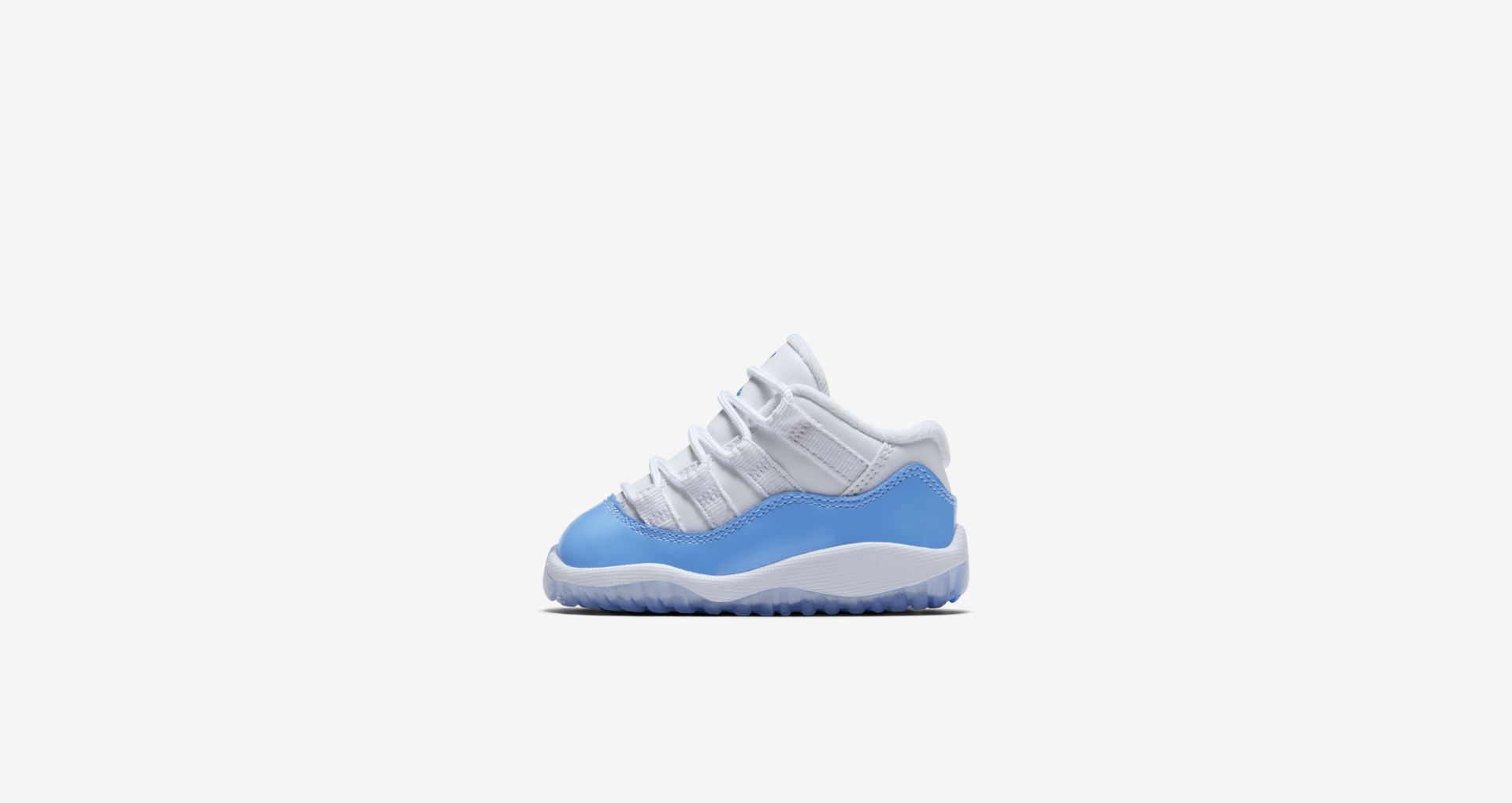 Air Jordan 11 Retro Low 'White & University Blue'. Nike SNKRS