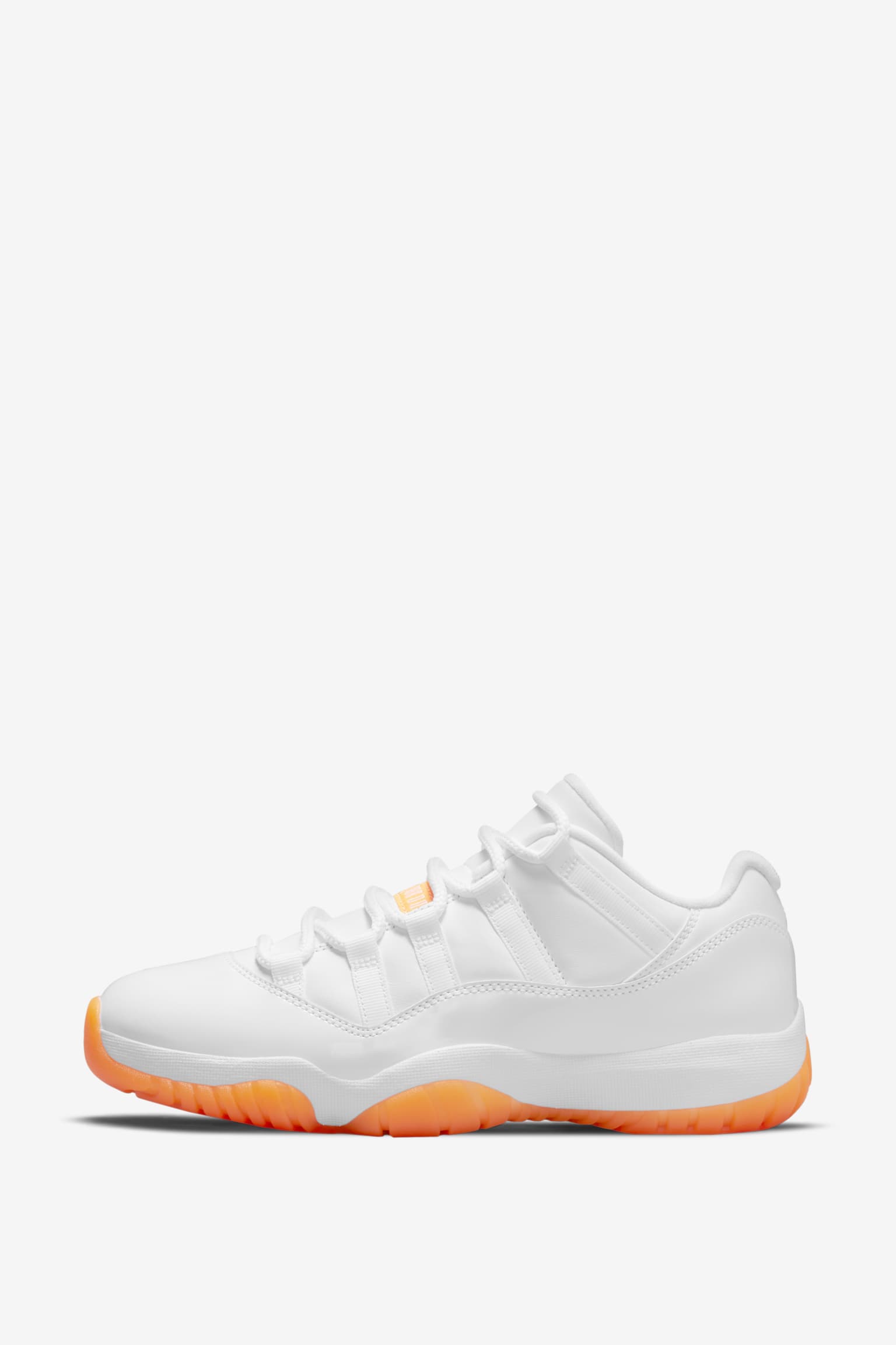 orange and white jordan 11 low