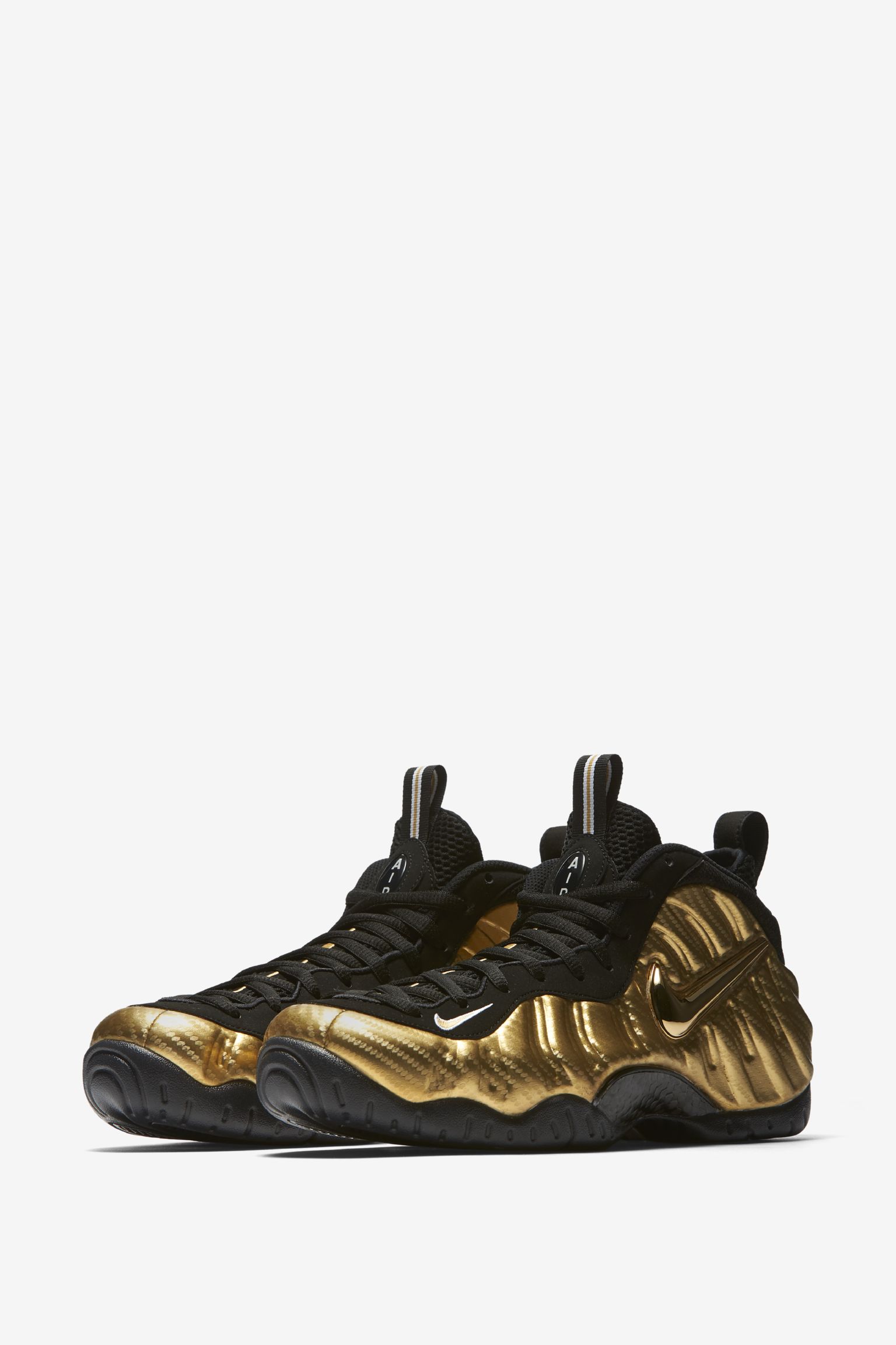 metallic gold and black foamposites
