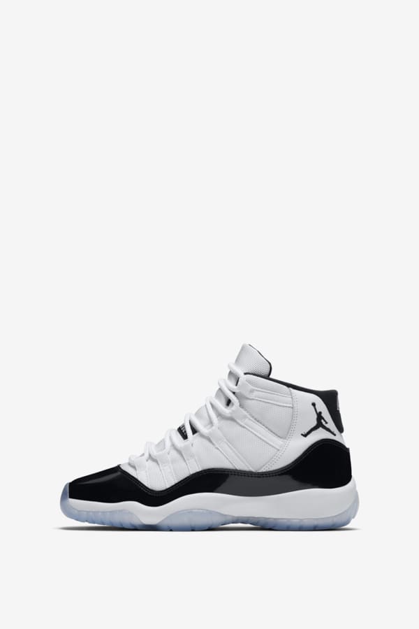Black and white air jordan 11 shop