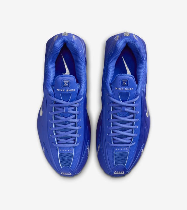 Women s Shox R4 Racer Blue and Metallic Silver HJ7303 445 release date. Nike SNKRS