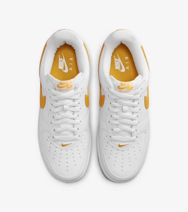 university gold nike air force 1