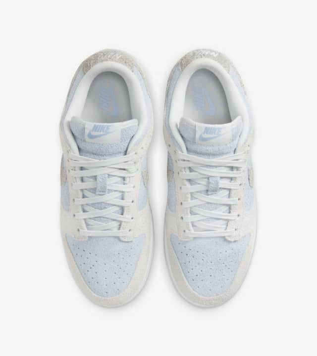 Women's Dunk Low 'Light Armoury Blue and Photon Dust' (FZ3779025) release date. Nike SNKRS IE