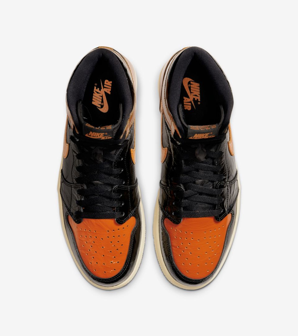 black orange white jordans