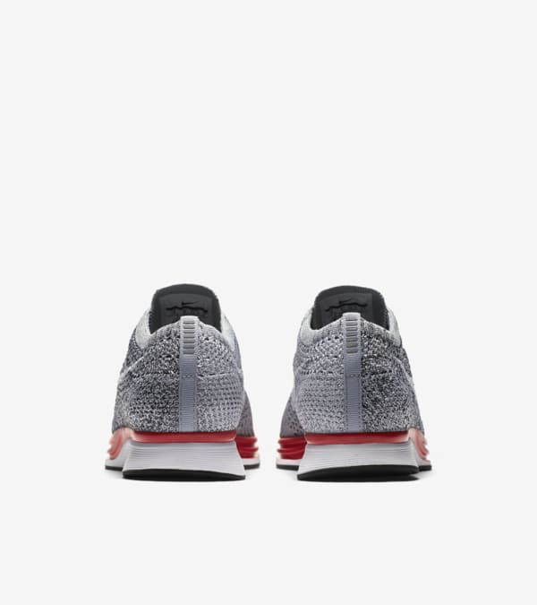 Nike flyknit racer grey red sales