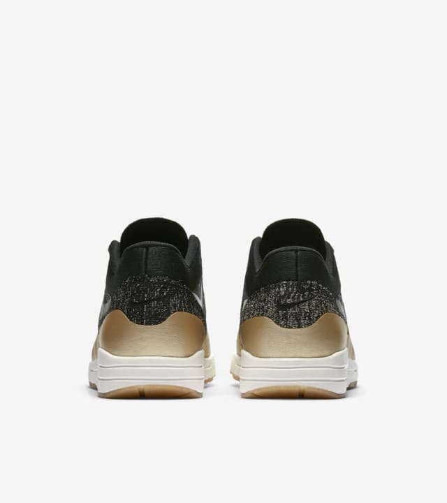 Women s Nike Air Max 1 Ultra 2.0 Flyknit Metallic Black Metallic Gold Nike SNKRS