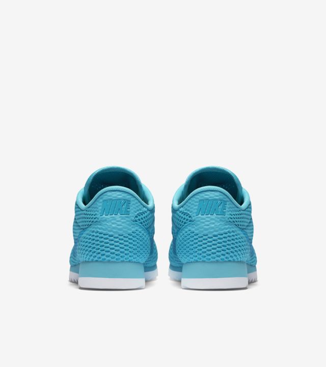 red white and blue nike roshe run