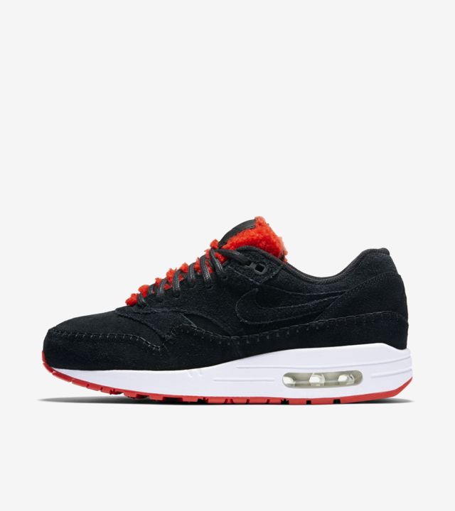 Women's Nike Air Max 1 Premium 'Black & Action Red'. Nike SNKRS