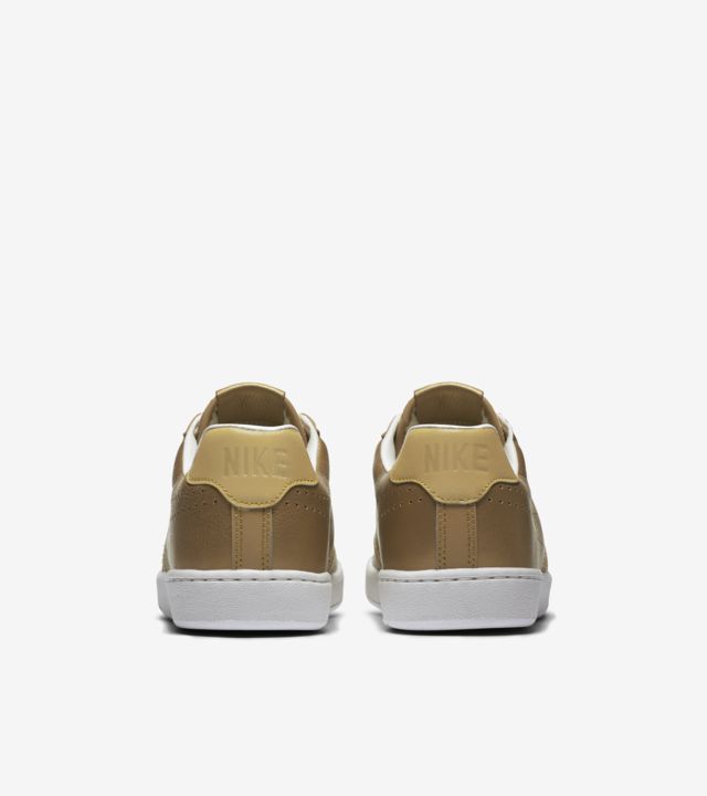 nike tennis shoes gold