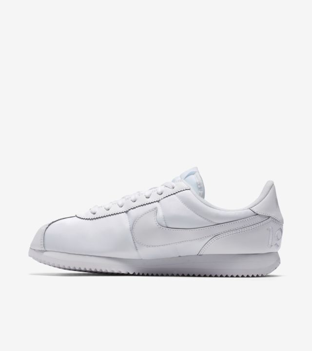 nike cortez all white on feet