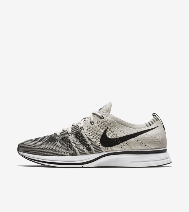 grey nike flyknit trainer