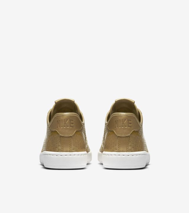 nike tennis shoes gold