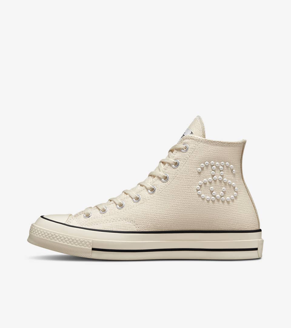 Converse by outlet nike