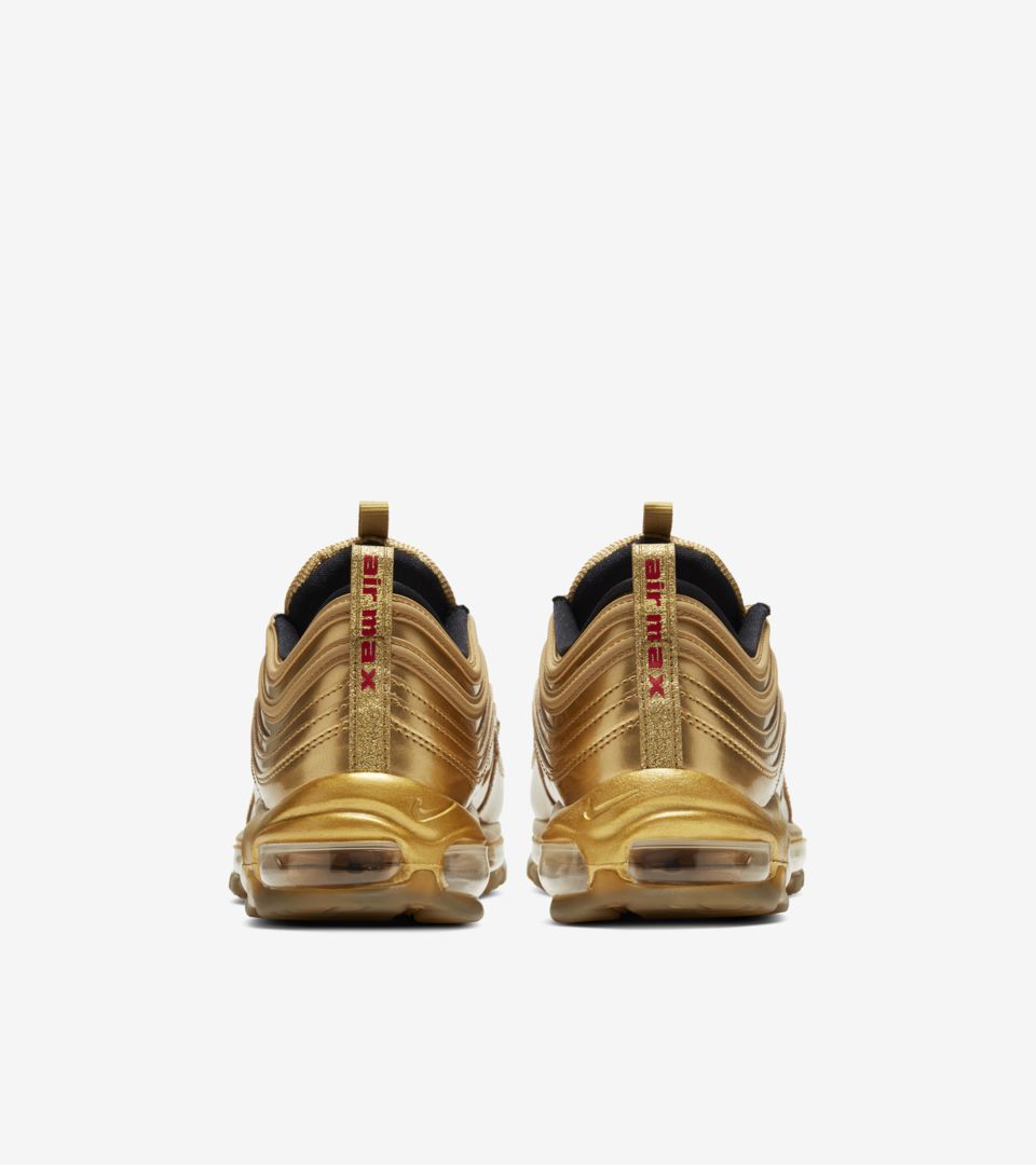 gold nike 97