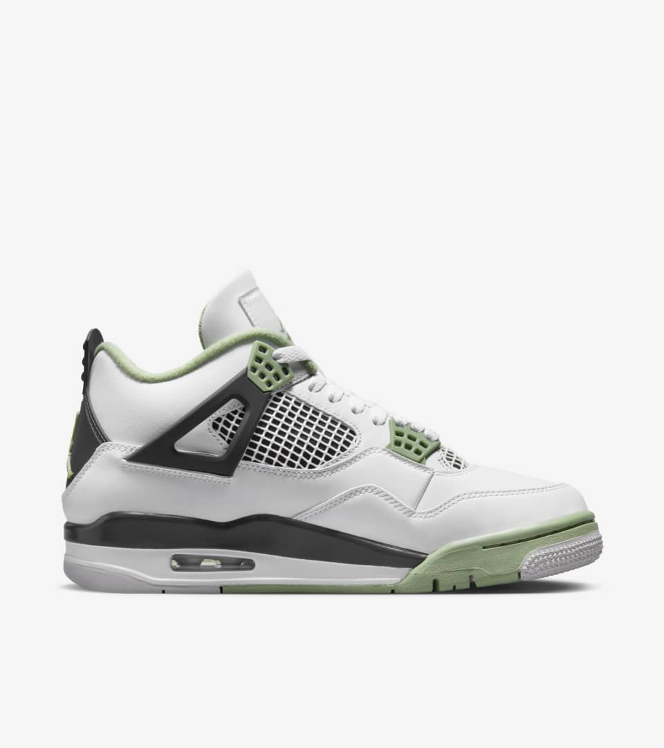 Jordan retro 4 store green and white