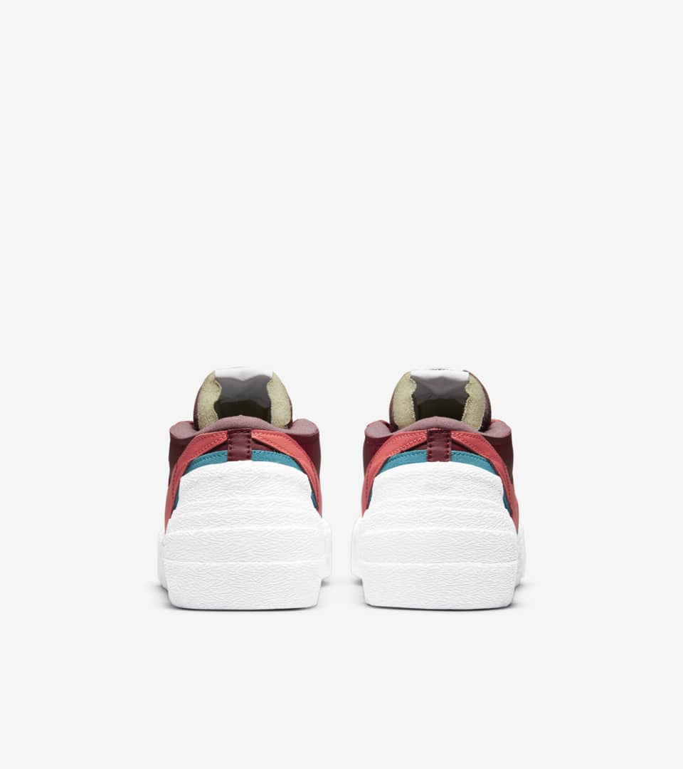 sacai x KAWS Blazer Low 'Team Red' (DM7901-600) Release Date. Nike