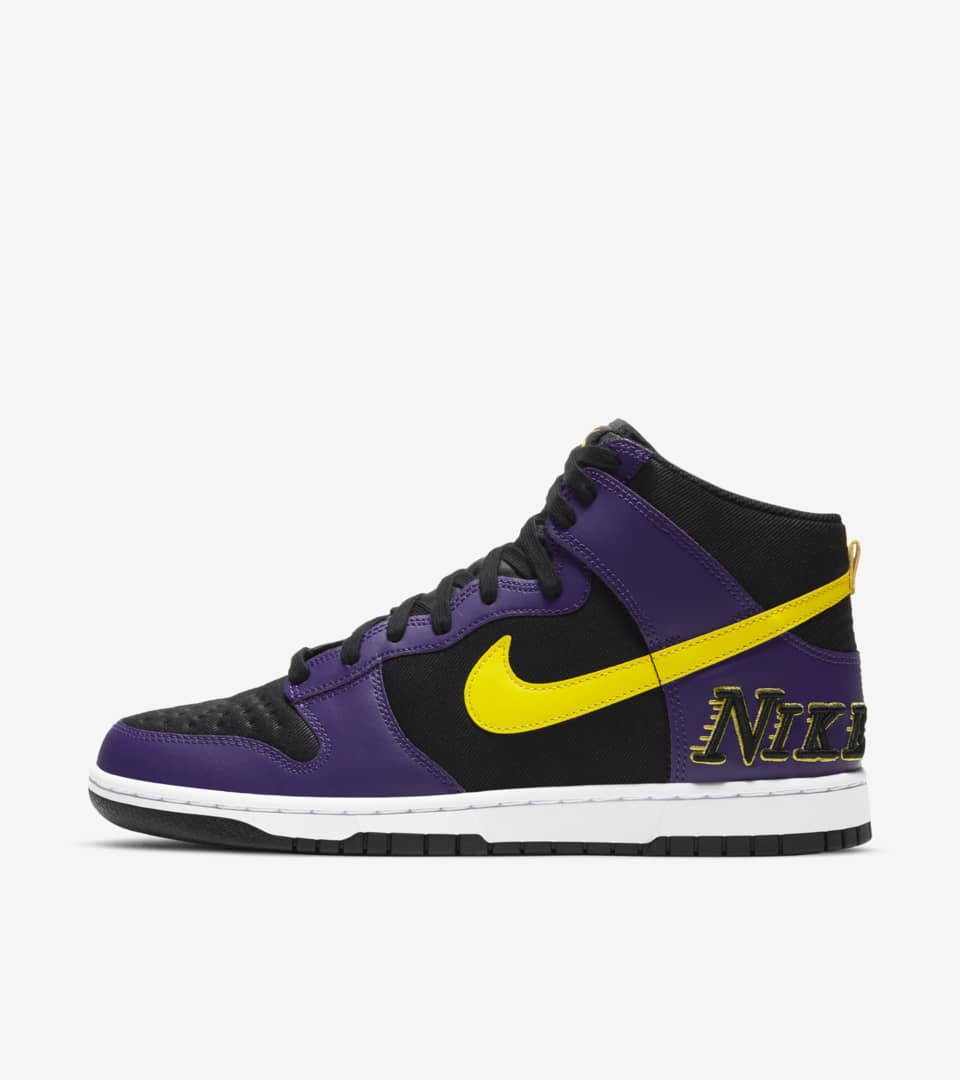 Nike purple yellow sales shoes