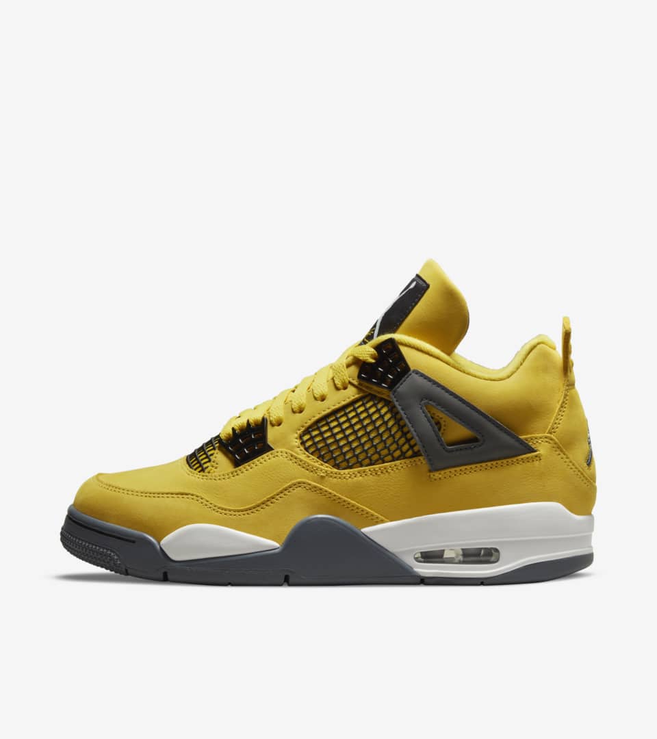 black and yellow 4 jordans