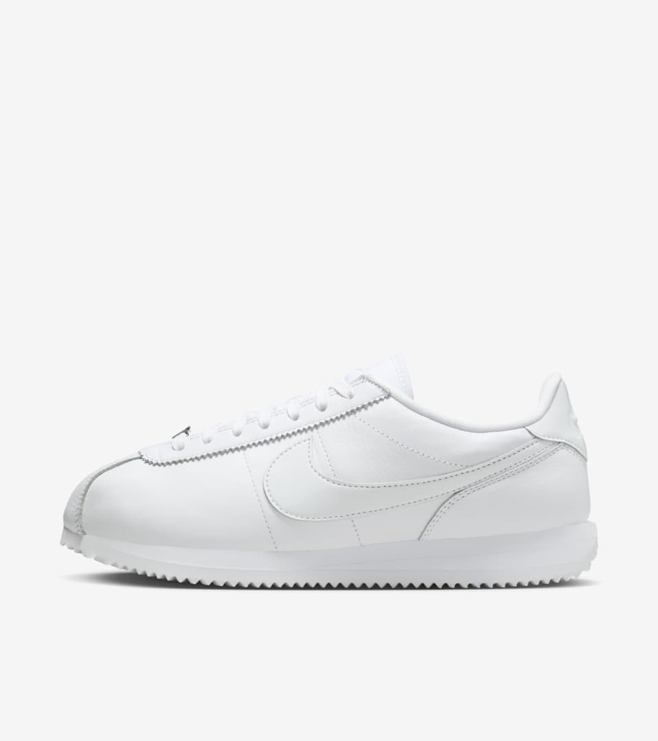 Plain white nike cortez deals