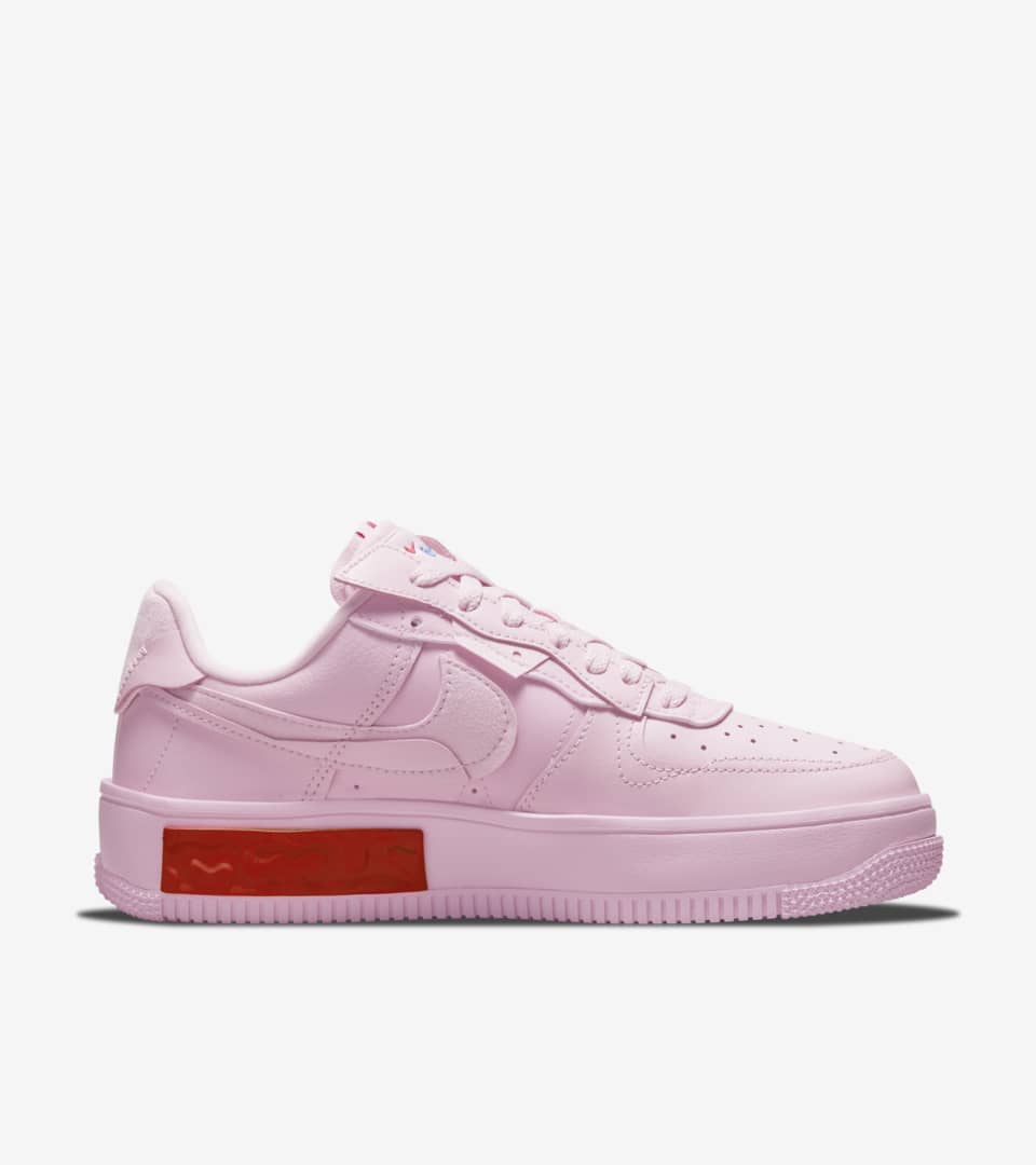pink and white nike air force 1