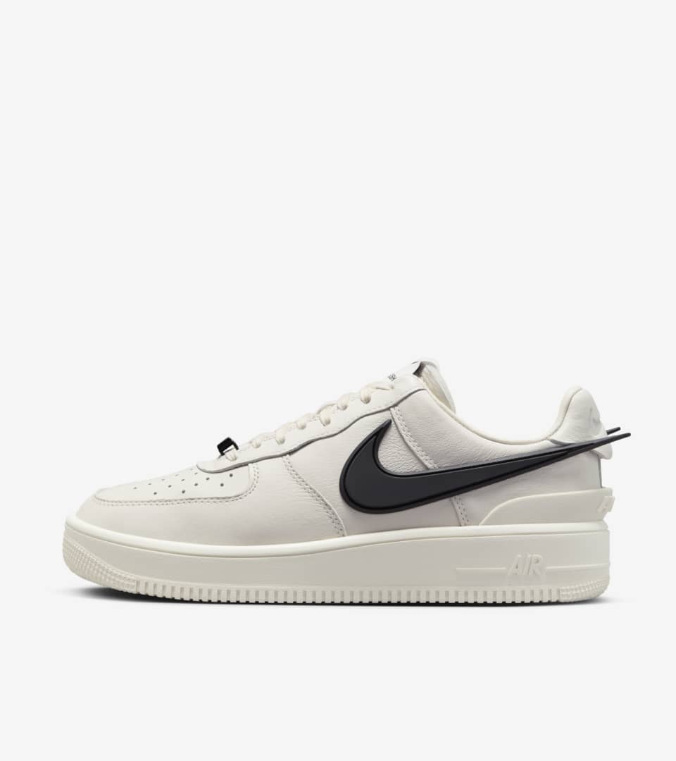 white air force 1 with black nike sign
