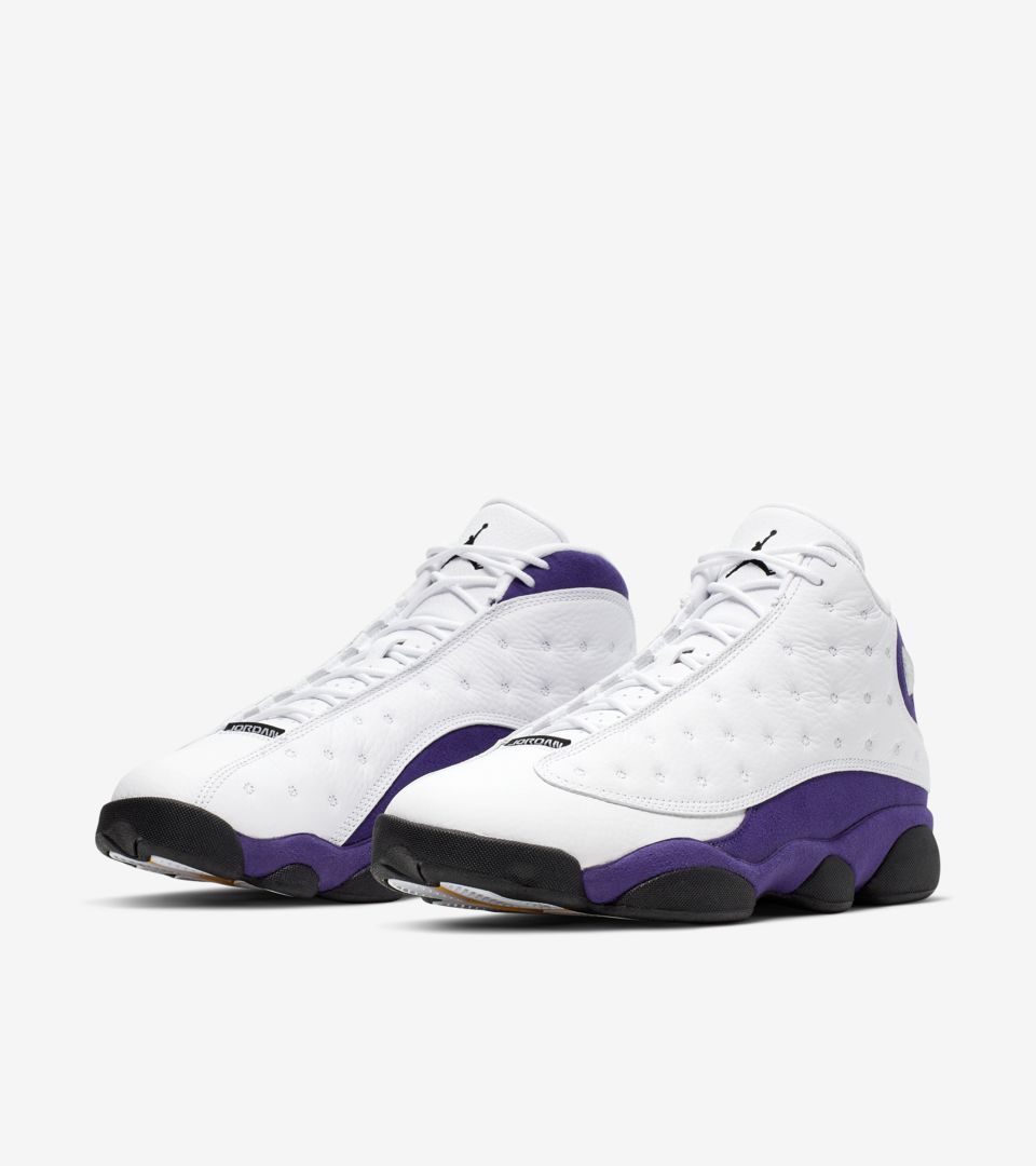 white jordans with purple