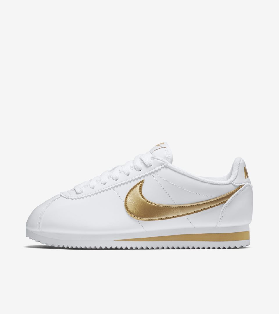 nike cortez gold swoosh