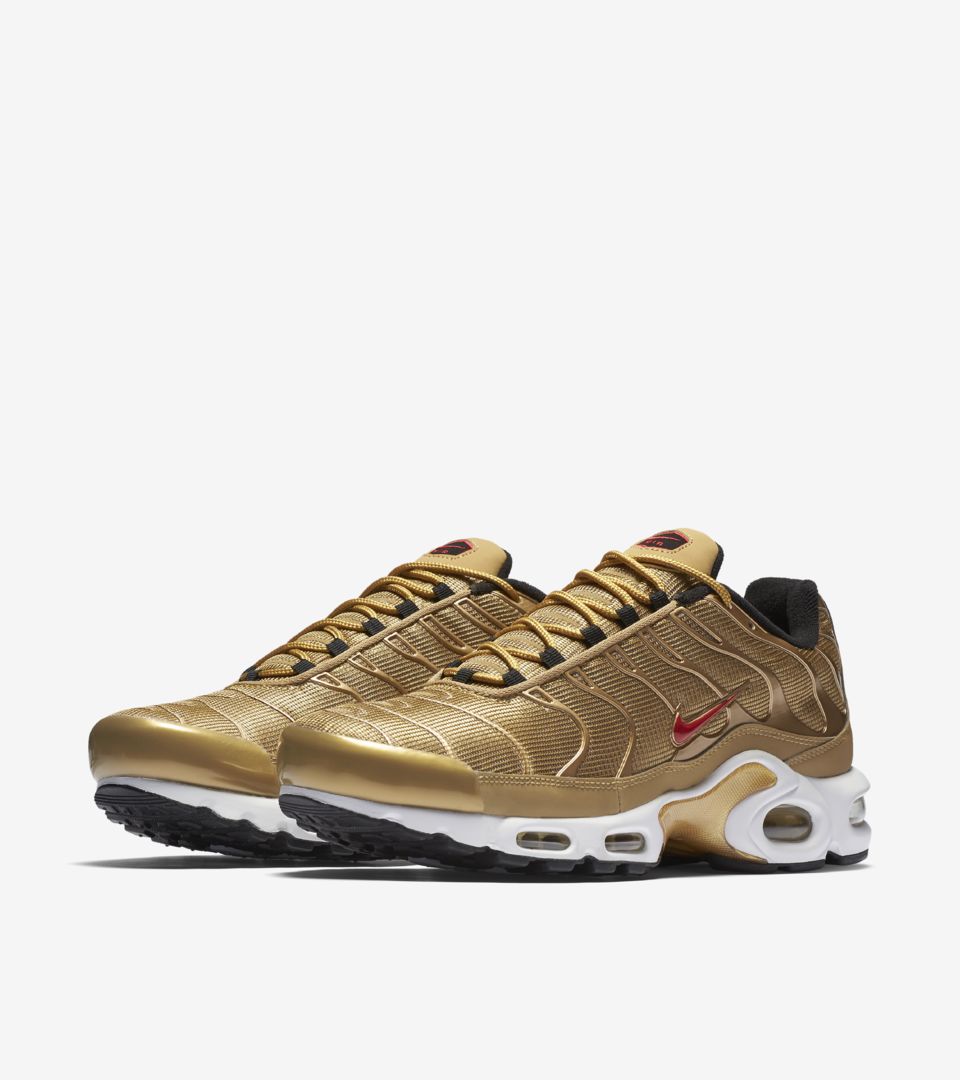 gold nike airs