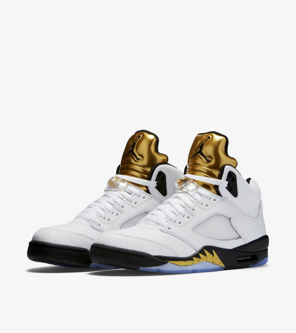 black and gold jordan 5