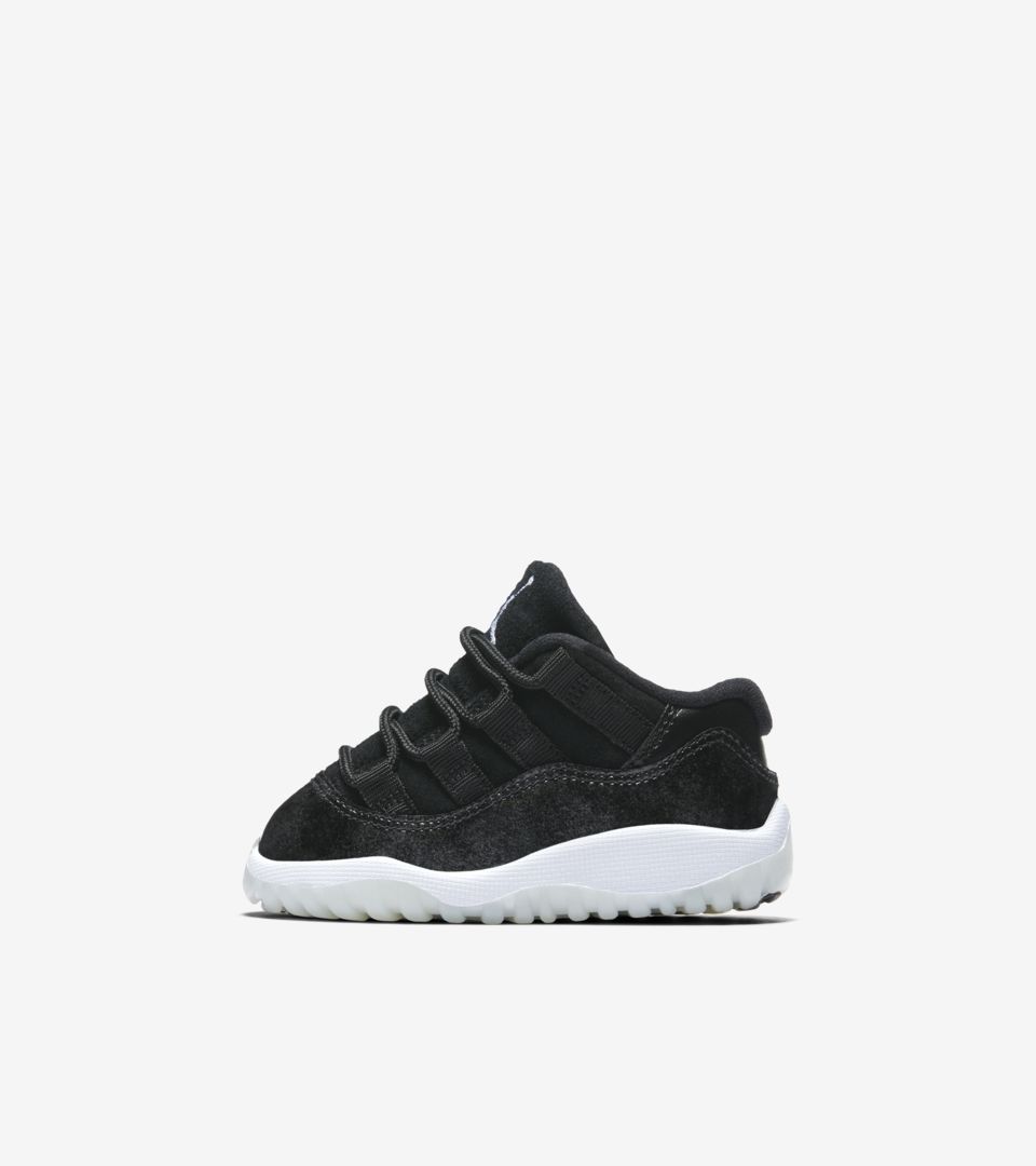 jordan 11 low black and white kids