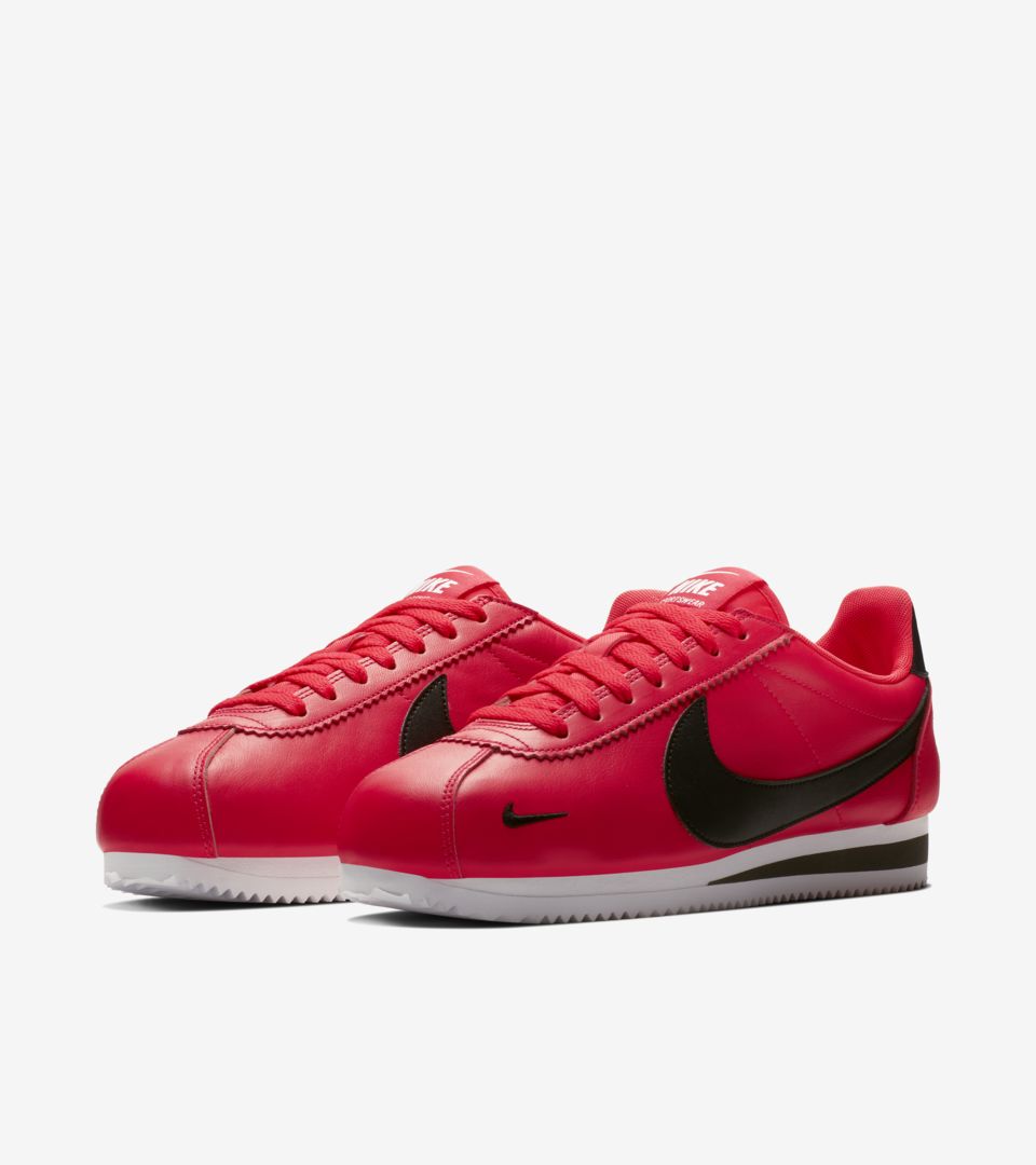 nike cortez with red swoosh
