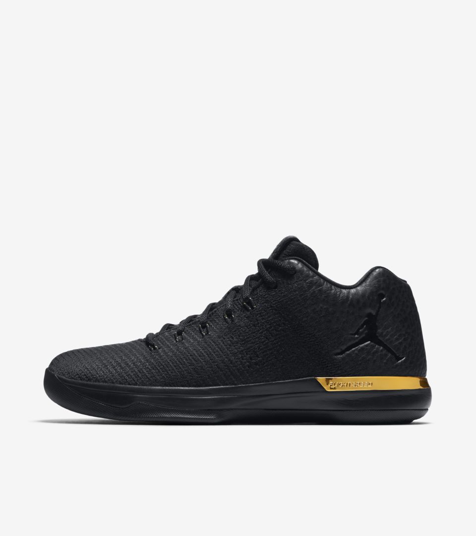 jordan sneakers black and gold