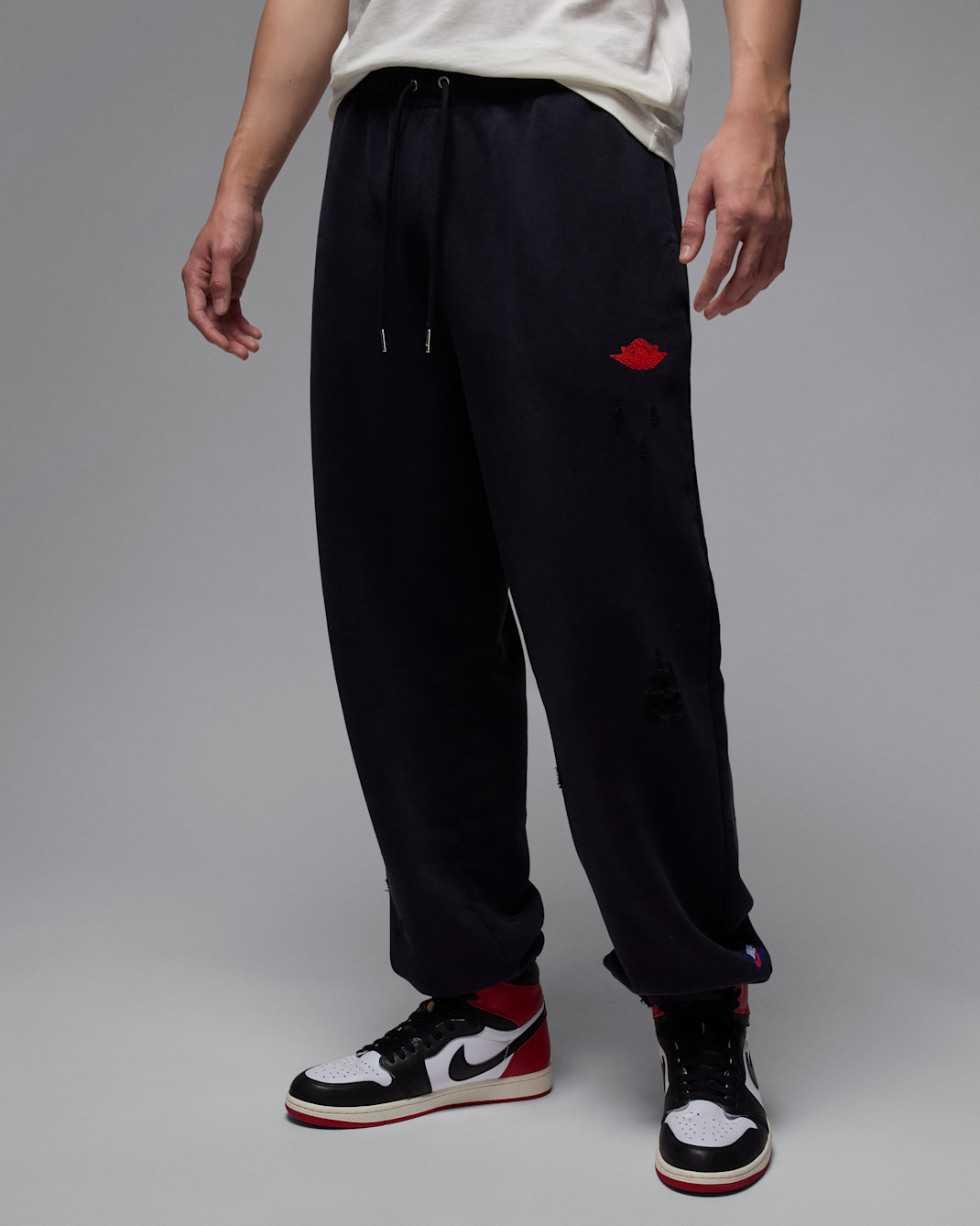 กางเกงขายาวผ้าฟลีซผู้ชาย Jordan Rare Air - ดำ/Sail