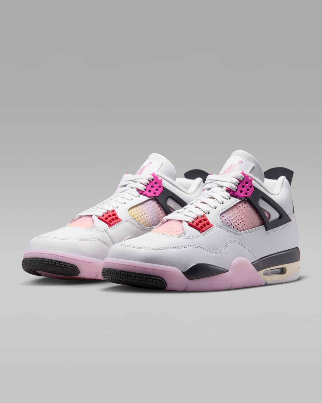 Air Jordan 4 Retro Comic JA1135-100 hero image showing off-white upper with pink orange yellow gradient netting comic speech bubble wing eyelets and sketched Nike Air heel