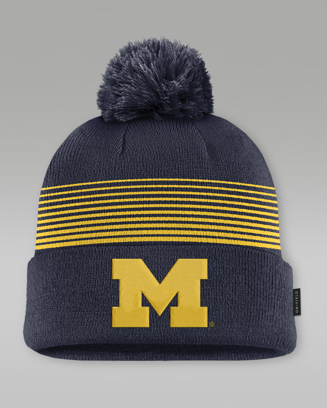 Michigan Sideline Peak Men's Jordan Brand College Cuffed Pom Beanie - College Navy/Amarillo