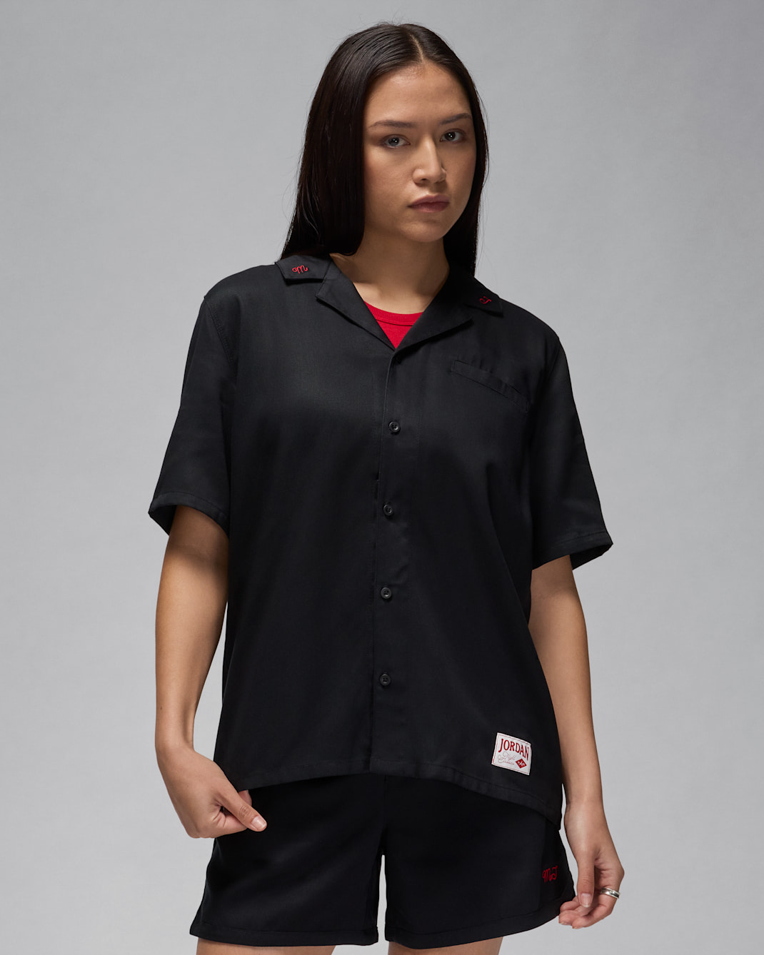 เสื้อแบบทอสีทึบผู้หญิง Jordan - ดำ/Gym Red