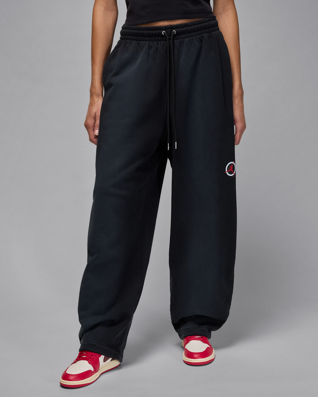 Rymliga byxor Jordan Flight Fleece för kvinnor - Svart