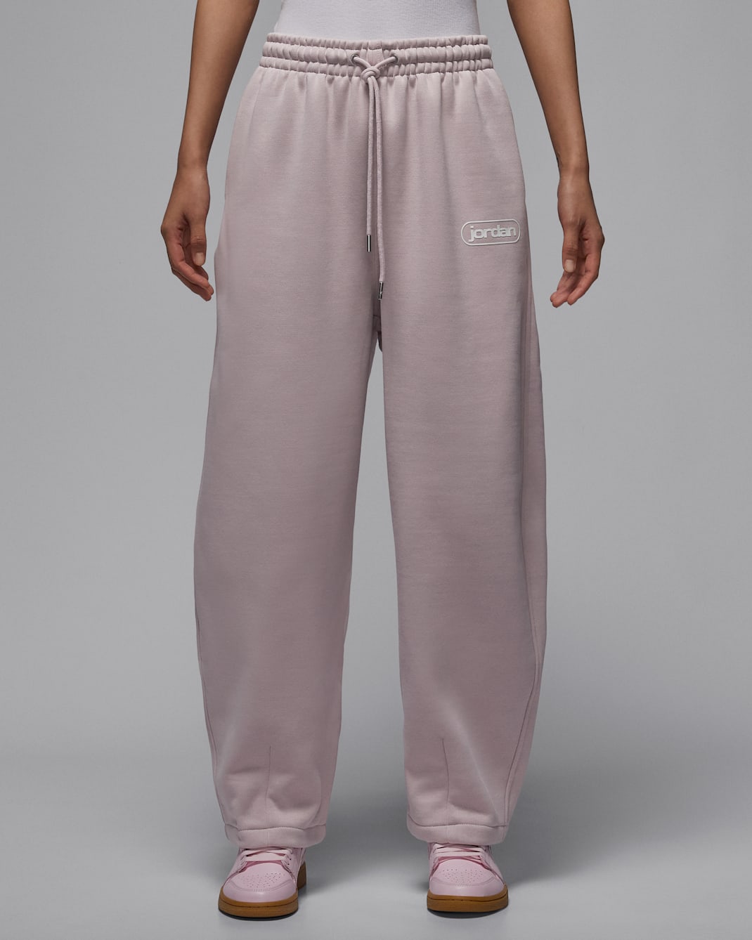 조던 플라이트 플리스 여성 배기 팬츠 - 파티클 로즈/세일