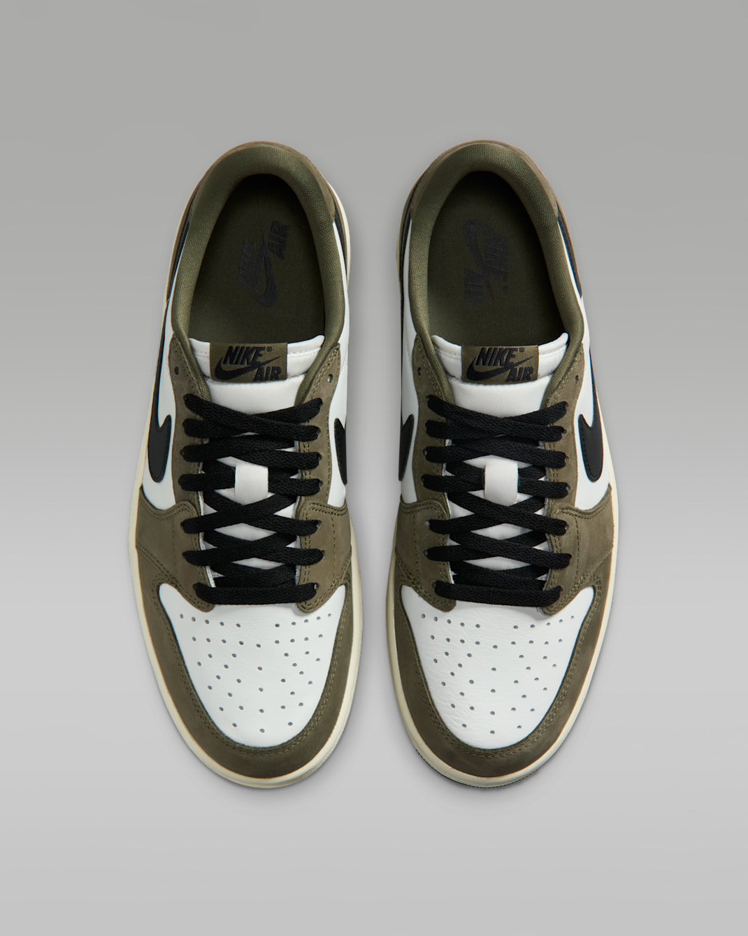 Air Jordan 1 Low OG Medium Olive side view showing olive nubuck overlays and black Swoosh