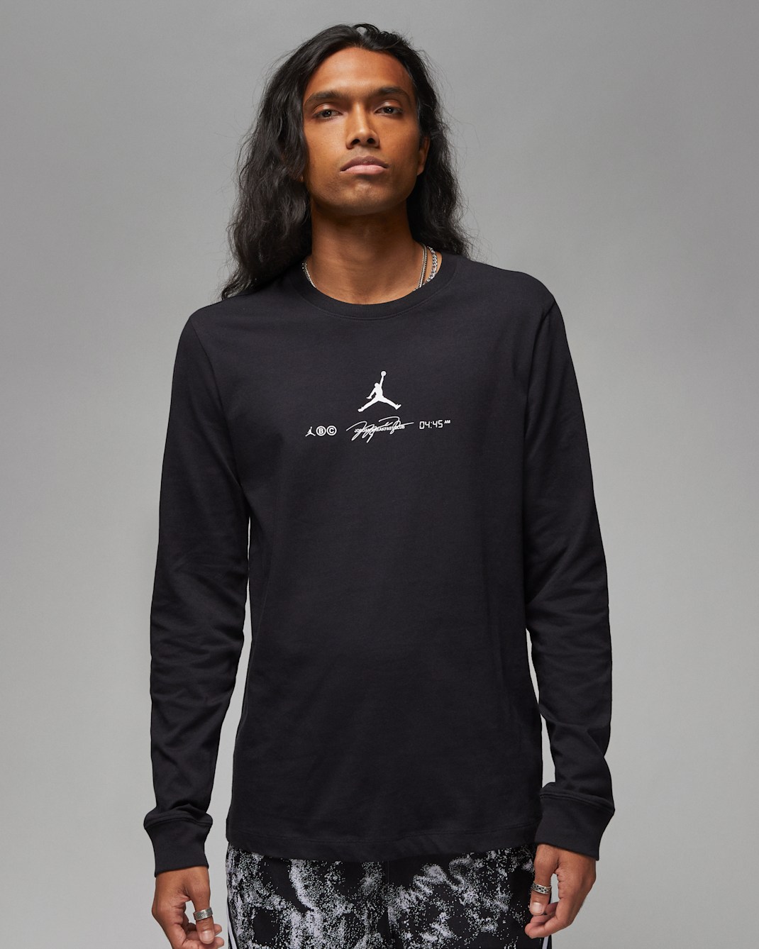 เสื้อยืดแขนยาวผู้ชายมีกราฟิก Jordan Dri-FIT Sport - ดำ/ขาว