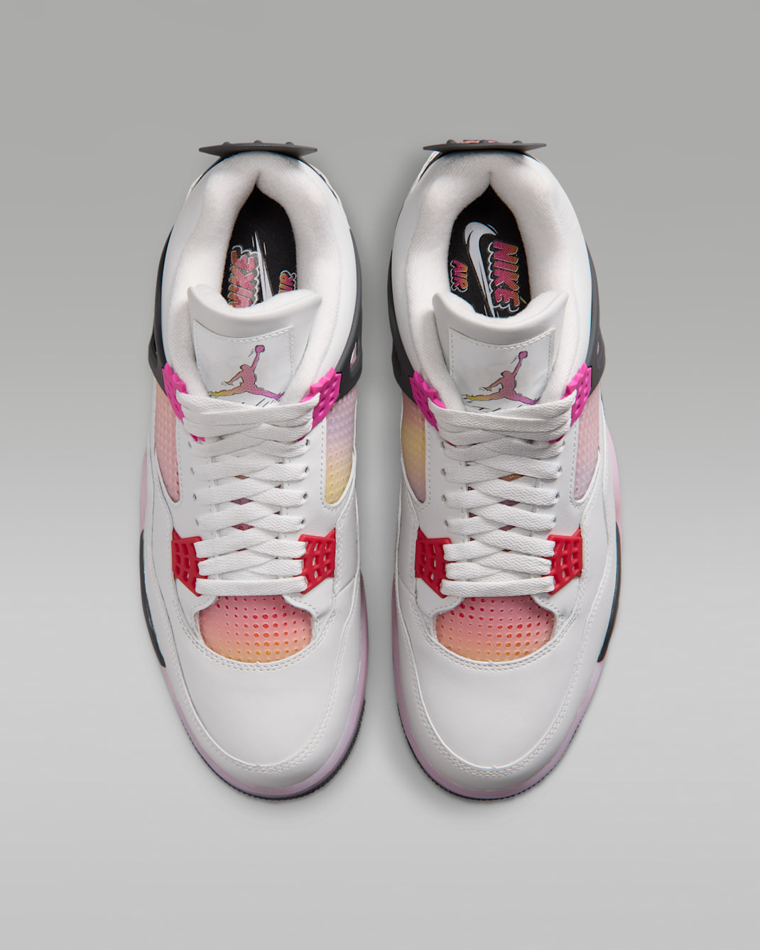 Air Jordan 4 Retro Comic top view showing pink gradient Jumpman tongue logo and Flight lettering