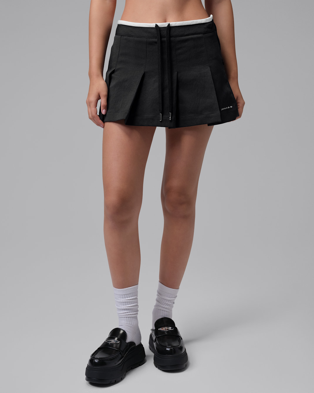 Mini jupe-short Jordan Flight pour femme - Noir/Blanc