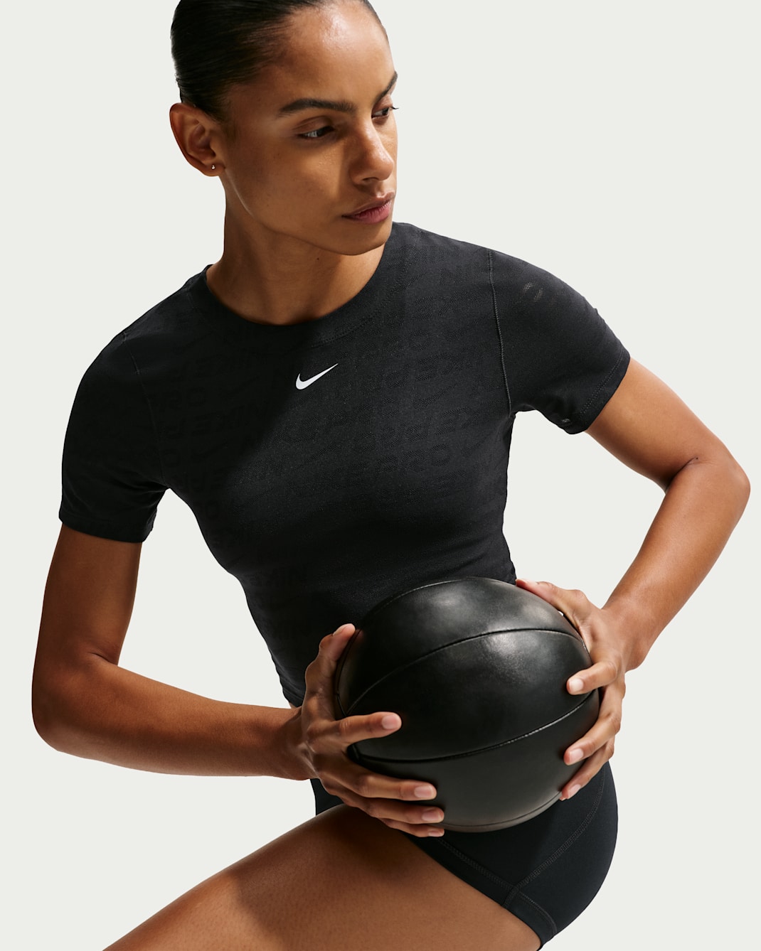 Playera de manga corta Dri-FIT de jacquard cropped para mujer Nike Pro - Negro/Blanco