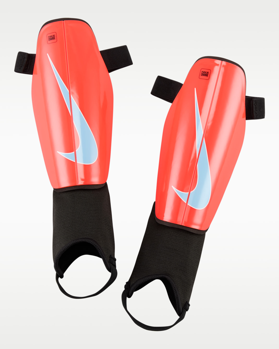 Espinillera de fútbol Nike Charge - Carmesí brillante/Negro/Tinte royal