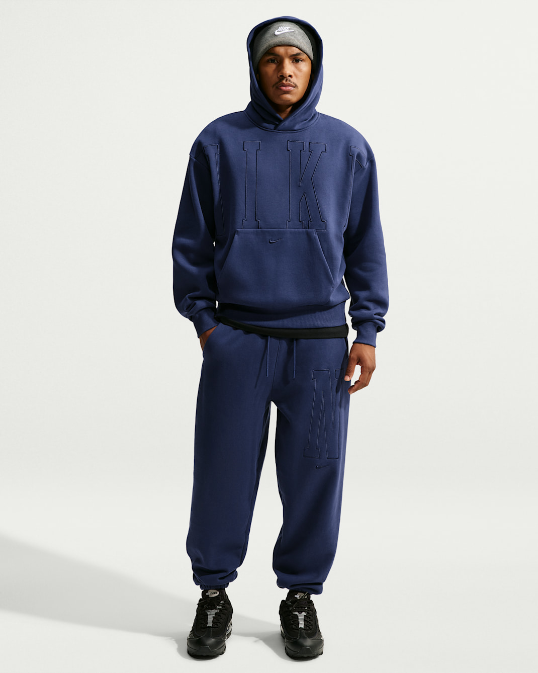 Pants holgados con puño para hombre Nike Solo Fleece - Azul marino medianoche/Obsidiana