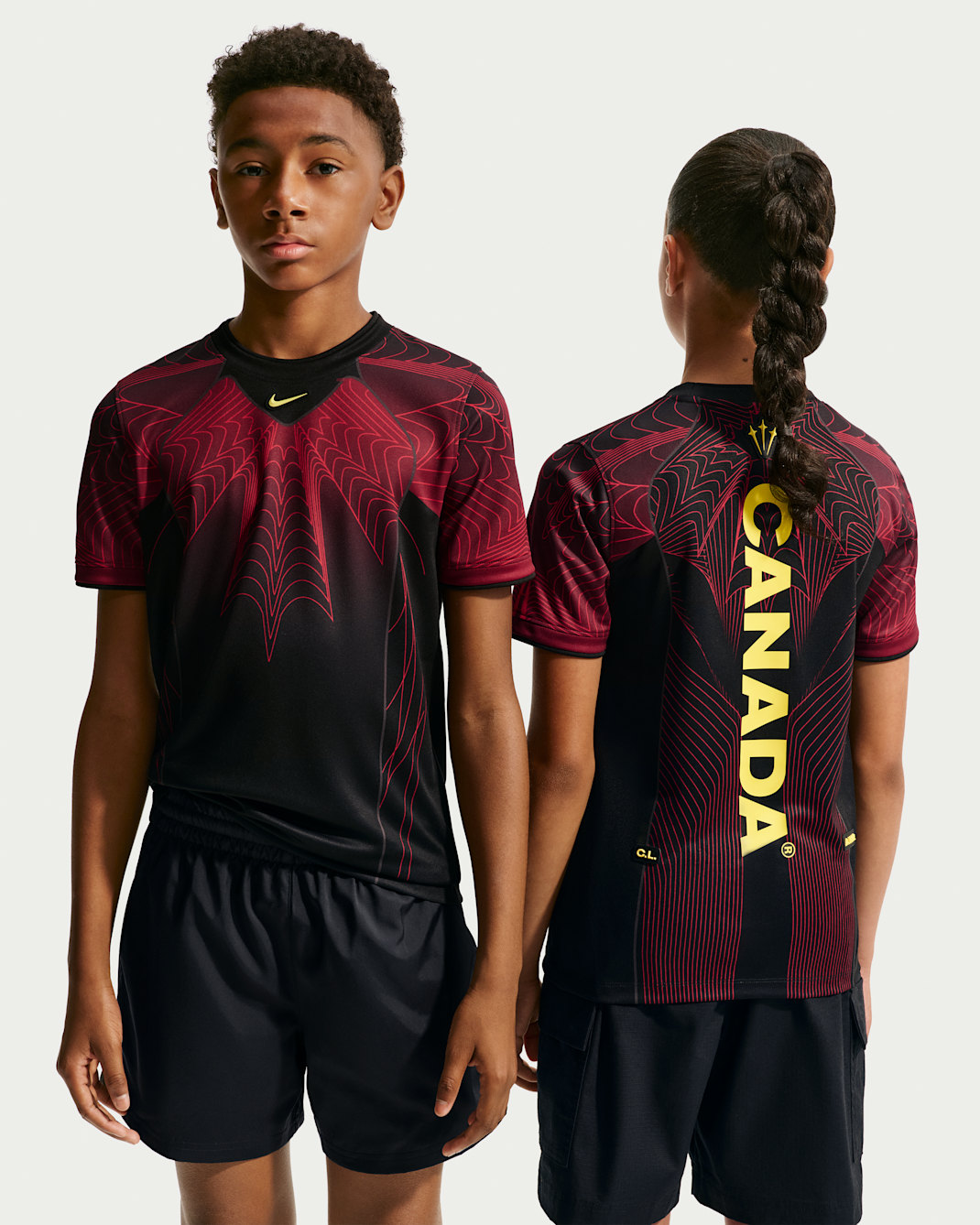 Canada Big Kids' Nike Dri-FIT Soccer Pre-Match Short-Sleeve Top - Black/University Red/Sonic Yellow
