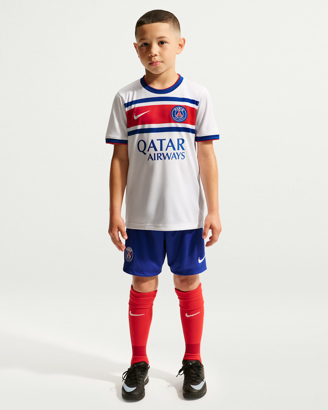Paris Saint-Germain Home Big Kids' Nike Dri-FIT Soccer Pre-Match Top